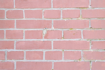 Obraz premium Old red brickwork with different defects