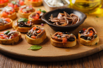 Mix Bruschetta with sardines and anchovies.