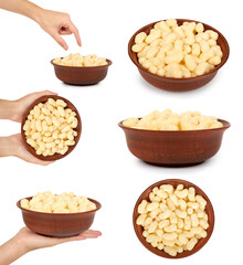 set of different Light and delicious corn sticks with hand, isolated on white background, healthy sweet snack