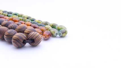 Closeup of  tasbih or rosary on a white background. Selective focus and copy space.