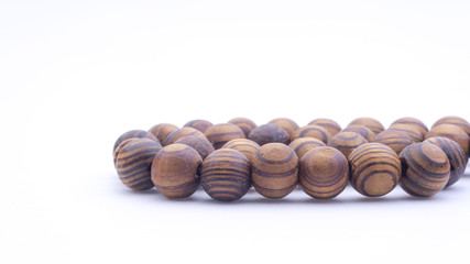Closeup of  tasbih or rosary on a white background. Selective focus and copy space.