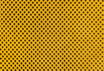 yellow breathable porous poriferous material for air ventilation with holes