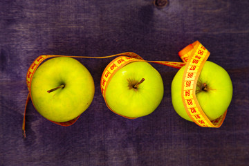 Apples and measuring tape