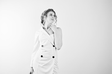 Curly hair girl isolated on white studio background.