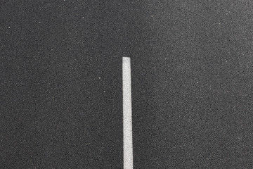 Asphalt road with white mark line.