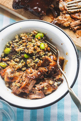 Superfood: couscous, lentils & edamame soybeans with slow cooked pulled pork in hoisin sauce. 