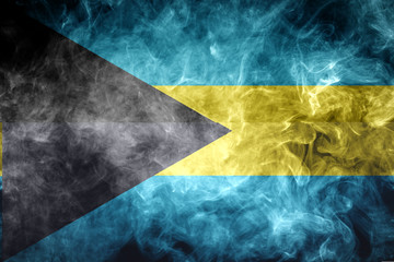 National flag of Bahamas from dense colored smoke on a black isolated background