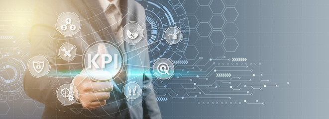 Key Performance Indicator (KPI) using Business Background with infographic versus planned target, person touching screen icon, success concept.