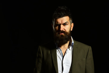 Man in business suit with confident and tricky face