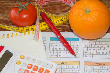 Citrus fruits, tomato. Concept of weight loss. Healthy lifestyle diet with fresh fruits. Diet concept