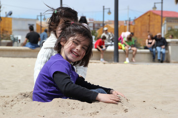 PLAYING AT THE BEACH