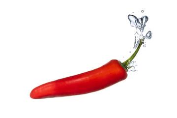 Red chilli pepper water splash with bubbles