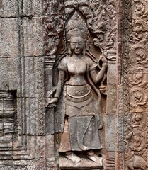 Fototapeta na wymiar Angkor Steinreliefs, Steinmetzarbeit der Khmer in Kambodscha