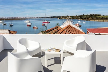 View from the terrace, to the bay with yachts in the town of Alvor.