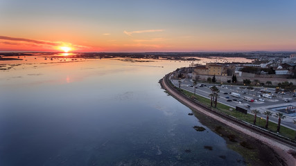 Aerial. Delightful sunrise above the old town of Faro Portugal.