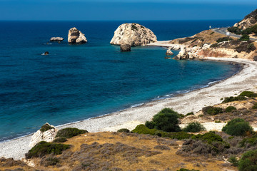 Fototapeta na wymiar Petra tou Roumiou, Aphrodite's rock. Rocky coastline on the Mediterranean sea in Cyprus.