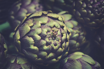 Close up of fresh vegetable artichokes in italian farmer market.