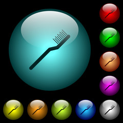 Toothbrush icons in color illuminated glass buttons