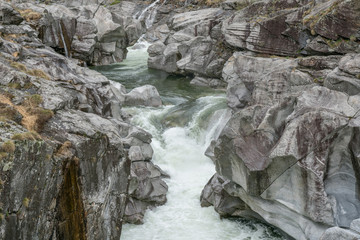 fantastic view of the Maggia river carving ist way through a wild rocky gorge