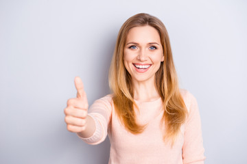 Fototapeta premium People person optimism positivity recommend concept. Close up portrait of charming stunning pretty attractive cute lovely woman showing finger up sign isolated on gray background copy-space