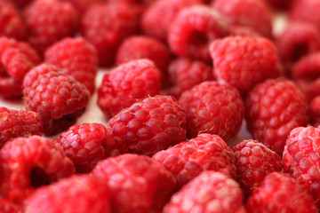 Heap of raspberries full frame used as background, close-up