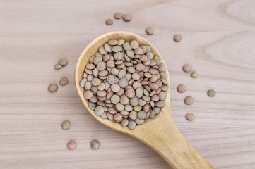 wooden spoon full of lentils