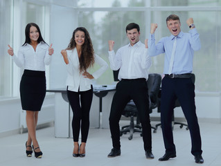 Fototapeta premium portrait of a triumphant business team