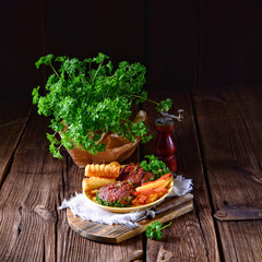 grilled bullets with croquettes and vegetables