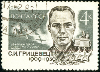 Ukraine - circa 2018: A postage stamp printed in USSR show Twice Hero of the USSR Gritsevets....