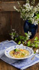 soup with duck, spring flowers