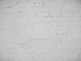 White background of old brick wall texture with delicate vignetting.