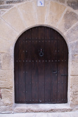 Fototapeta na wymiar Old door in Calaceite village in Teruel Spain