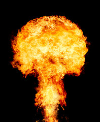 Explosion - fire mushroom. Mushroom cloud fireball from an explosion at night. Nuclear explosion. Symbol of environmental protection and the dangers of nuclear energy