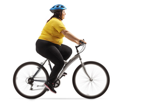Overweight woman riding a bicycle