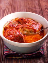 Chicken breast stuffed with herb philadelphia cheese in tomato sauce