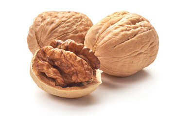 Useful walnuts, close-up, isolated on white background.
