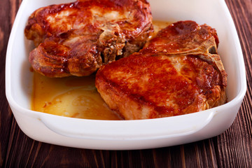 Roasted pork chops on a bone