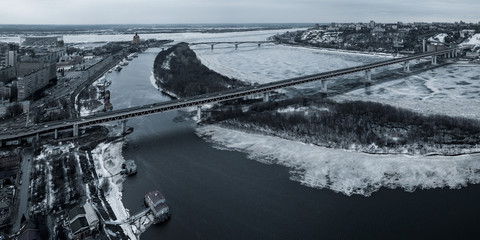 A bridge across the Volga River in the spring on a cloudy day. Nizhny Novgorod