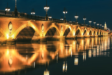 Fototapeta na wymiar Twilight at Pont de Pierre bridge in Bordeaux, France 