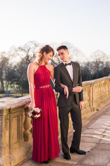 The beautiful young elegant, happy couple standing outdoor together