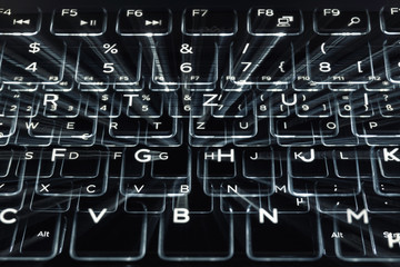Abstract background of a zooming keyboard long exposure. Hacker concept.