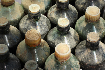 Old dusty and dirty glass bottles