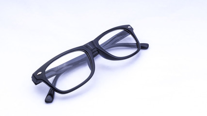 Closeup of glasses or spectacles isolated on white background. Selective focus.