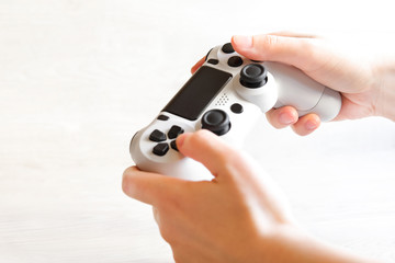 gaming game play tv fun gamer gamepad guy controller video console playing player holding hobby playful enjoyment view concept - stock image © Mariia Petrakova