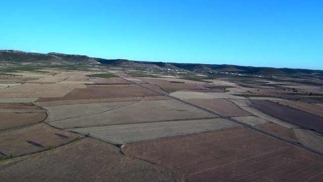 Yellow wheat field corn in spanish rural meadow. Aerial Footage. Albacete,Spain
