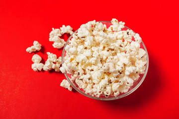 popcorn on color background