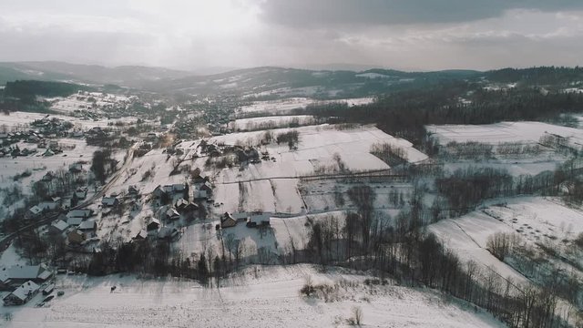 Drone shot of a southern Polish countryside in the winter. 