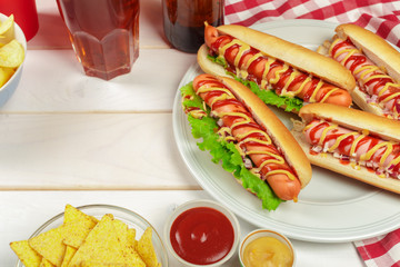 Hot dogs on wooden background