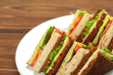 sandwich on a wooden table
