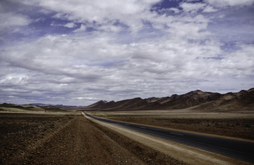 Fototapeta na wymiar Empty desert highway, Draa Valley Morocoo